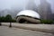 Chicago, IL, USA - May 18, 2019 - Cloud Gate the Bean sculpture in Millennium Park on a spring foggy early morning.