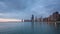 Chicago sunrise with clouds and waves on Lake Michigan