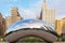 Chicago, USA - may 26, 2018: Reflection of city buildings on a metal surface of Cloud Gate also known as the Bean, Millennium Park