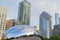 Chicago, USA - may 26, 2018: Reflection of city buildings on a metal surface of Cloud Gate also known as the Bean, Millennium Park