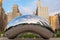 Chicago, USA - may 26, 2018: Reflection of city buildings on a metal surface of Cloud Gate also known as the Bean, Millennium Park