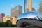 Chicago, USA - may 26, 2018: Reflection of city buildings on a metal surface of Cloud Gate also known as the Bean, Millennium Park