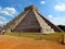 Chichen Itza, Mexico; April 16 2015: People visiting the ancient buildings of maya culture liek the pyramid, jaguar temple, planet
