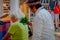 CHICHEN ITZA, MEXICO - NOVEMBER 12, 2017: Close up of Indian chaman using plants to cure an old woman inside of a store