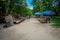 CHICHEN ITZA, MEXICO - NOVEMBER 12, 2017: Unidentified people walking close to a colorful handicrafts at outdoors inside