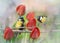 Chickadee birds on a branch among red tulips. Abstract blurred pastel background. Beautiful spring green background