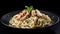 Chicken Alfredo, Tagliatelle with greens and cream sauce on a dark background, Fettuccine meal