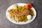 Chicken Bhuna Khichuri biryani white rice pulao with boiled egg and fried onion served in dish isolated on background top view of