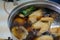 Chicken boiling in fish sauce soup. boiled chicken