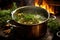 chicken broth simmering in a pot with herbs