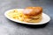 Chicken burger plate with french fries and salad