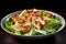 Chicken caesar salad on dark background