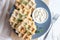 Chicken and cheese waffles with sour cream sauce