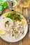 Chicken in cheesy creamy sauce served with rice