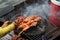 Chicken clamping bamboo grilling on grate