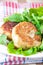 Chicken cutlets with salad greens