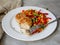 Chicken cutlets with steamed Mix vegetables, Chicken meat balls on white plate. Heathy lunch, diet food. Selective focus, close up