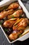 Chicken drumstick baked with pears and red onion in honey sauce