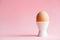 Chicken egg in eggcup