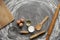 Chicken egg, flour, olive oil, milk, kitchen tool on gray table background