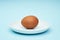 Chicken egg on a saucer, a plate. Food, protein in foods.