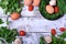 Chicken eggs, champignons, cherry tomatoes and greenery framing copy space