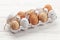 Chicken eggs pack on wooden table