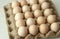 Chicken eggs in a package homemade rustic