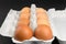 Chicken eggs in pulp egg carton