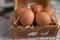 chicken eggs in the straw nest seen from above animal husbandry