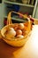 Chicken eggs in a wicker basket