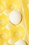 Chicken eggs in yellow packaging close up