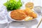 Chicken escalope with baked potatoes, mayonnaise and lemon