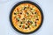 Chicken Fajita Pizza isolated on wooden background, spiced chicken cubes and cheese combination on bread, Italian food top view