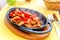 Chicken fajita smoking hot served on iron plate