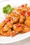 Chicken fillet in tomato sauce with sesame seeds, chili