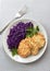 Chicken fritters and stewed red cabbage with caraway