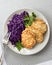 Chicken fritters and stewed red cabbage with caraway