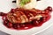 Chicken grill with rice and cherry sauce