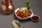 Chicken Hakka Schezwan Noodles served in a bowl with Schezwan sous . selective focus