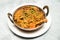 Chicken karahi, indian spicy chicken masala isolated on background top view of pakistani chicken karai