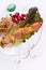 Chicken kebab with rice and vegetables on a white background on a transparent plate decoratet with glass stones