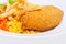 Chicken Kiev with corn and french fries