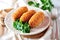 Chicken Kiev cutlets with parsley leaves. Ukrainian tradition food.