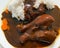 Chicken Legs in a Dark Mole Sauce with Carrots and White Riice