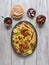 Chicken Mandi with dates on a wooden table. Arabic cuisine