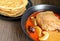 Chicken Massaman curry served with roti parata or roti canai on old wood backgroud.