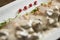 Chicken meat on grated gnocchi in cream sauce of mushrooms and smoked cheese