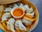 Chicken momo or dim sums or dumplings