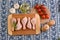 Chicken parts on wood board